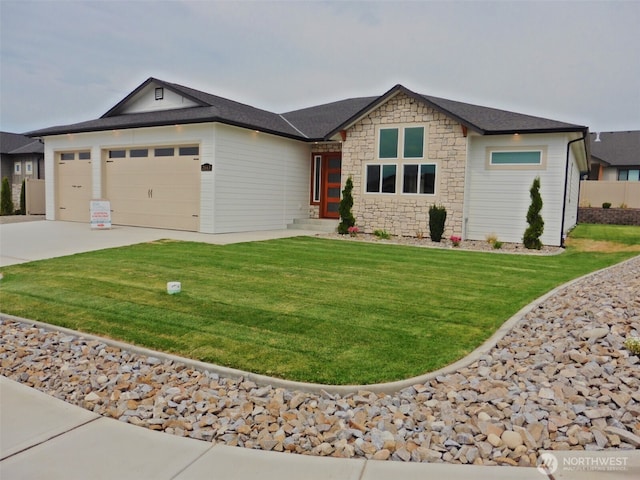 single story home featuring stone siding, driveway, a front yard, and a garage