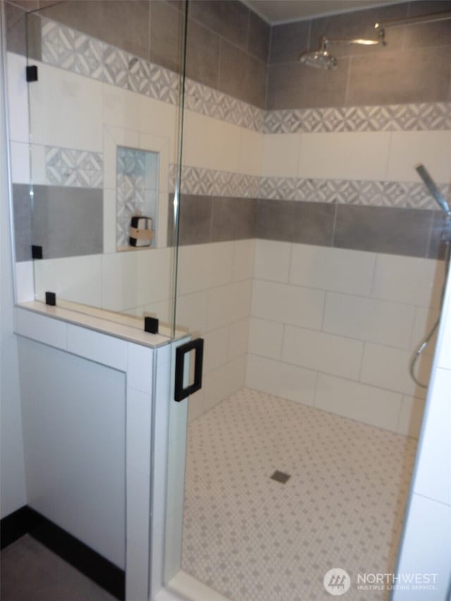 bathroom with a stall shower