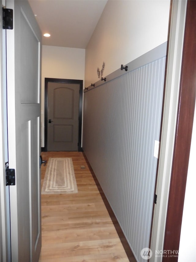 corridor featuring light wood-style flooring