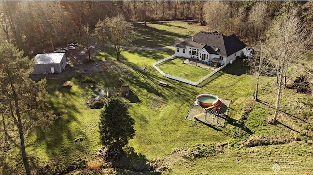 aerial view with a wooded view