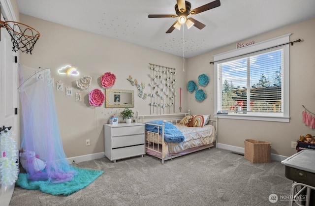 bedroom with carpet flooring, a ceiling fan, and baseboards