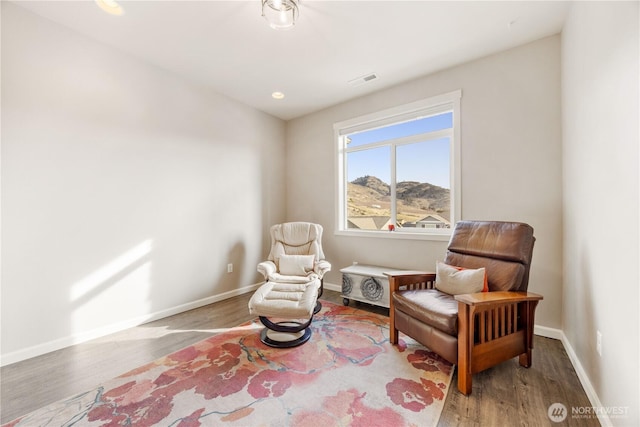 sitting room featuring recessed lighting, visible vents, baseboards, and wood finished floors