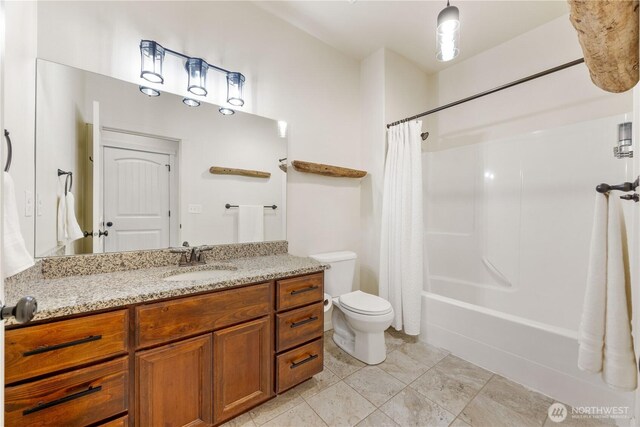 full bath featuring toilet, vanity, and shower / bathtub combination with curtain