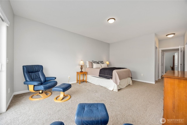 bedroom with baseboards and carpet flooring