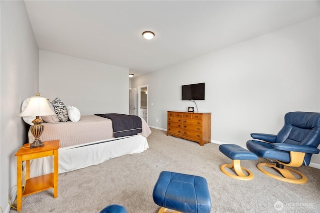 bedroom featuring carpet flooring and baseboards