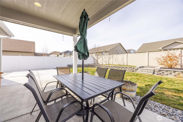 view of patio / terrace with outdoor dining area and a fenced backyard