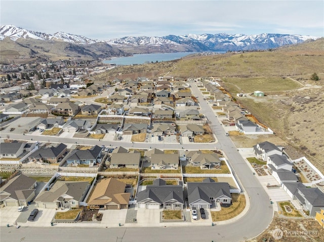 bird's eye view featuring a mountain view and a residential view