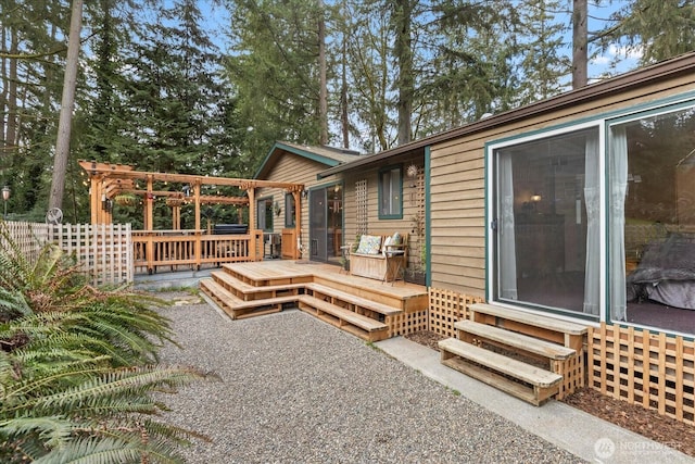 exterior space with a wooden deck and entry steps