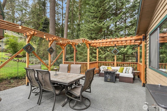 view of patio with an outdoor living space with a fire pit, outdoor dining area, and a pergola