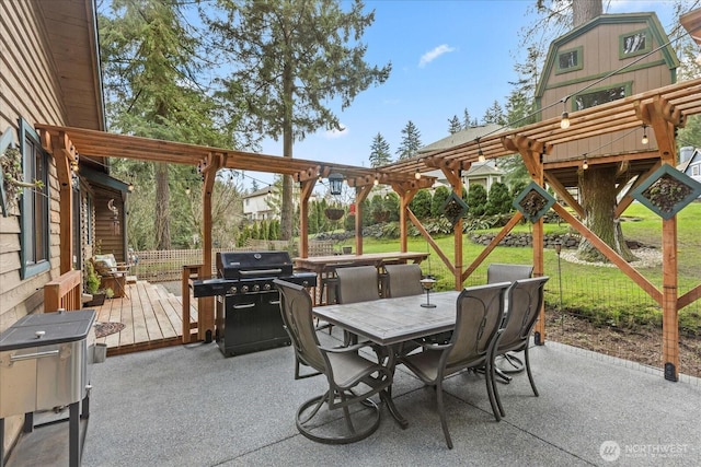 view of patio featuring outdoor dining area, a deck, grilling area, and a pergola