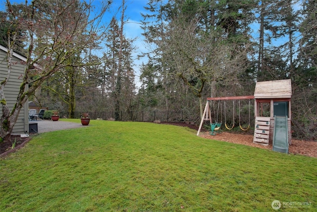 view of yard featuring a playground