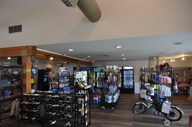 interior space featuring visible vents, recessed lighting, and wood finished floors