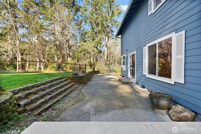 view of patio with fence