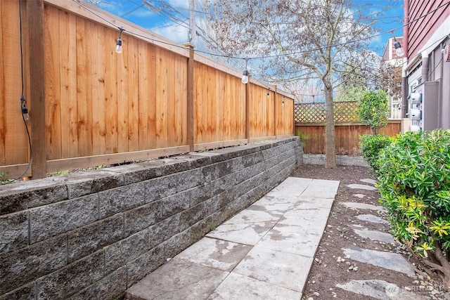 view of patio with fence