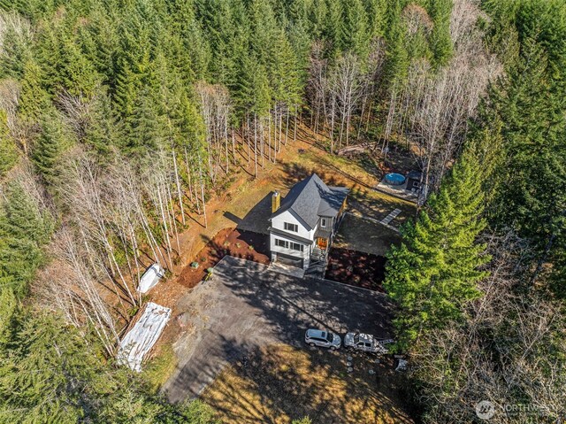 aerial view featuring a view of trees