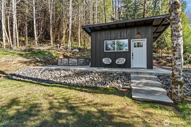 view of outbuilding with an outdoor structure