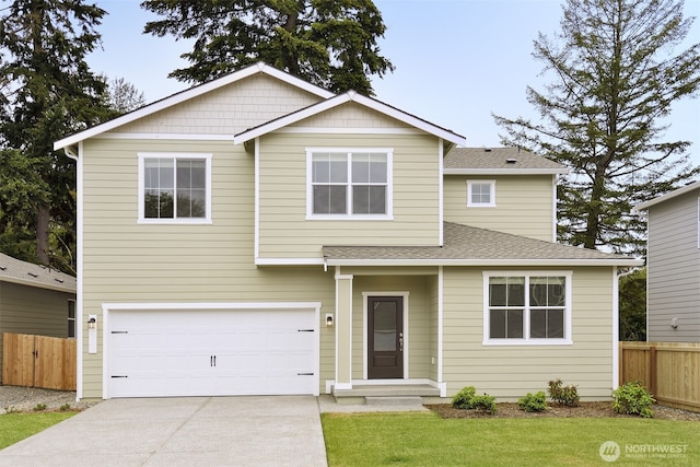 traditional-style house with an attached garage, driveway, roof with shingles, and fence