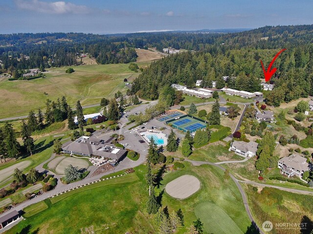 drone / aerial view with a view of trees