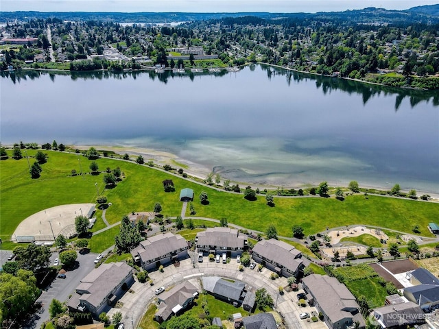 drone / aerial view with a water view