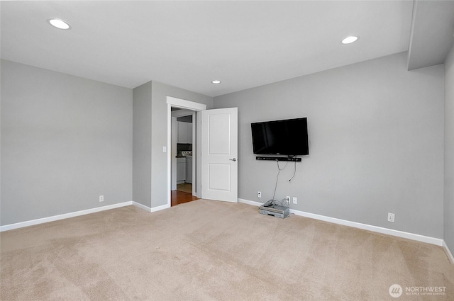 interior space with recessed lighting, baseboards, and carpet floors