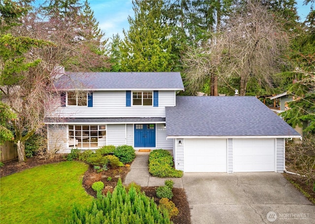 traditional home with roof with shingles, driveway, a chimney, a front lawn, and a garage