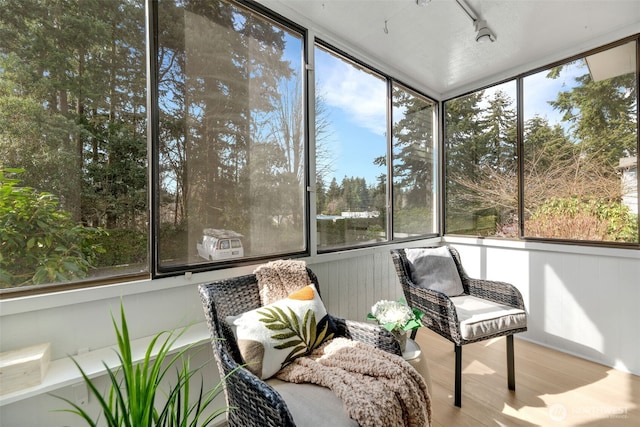 sunroom / solarium with plenty of natural light