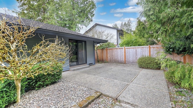 view of patio / terrace featuring fence