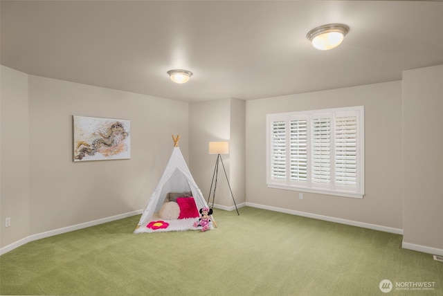 game room featuring baseboards and carpet floors