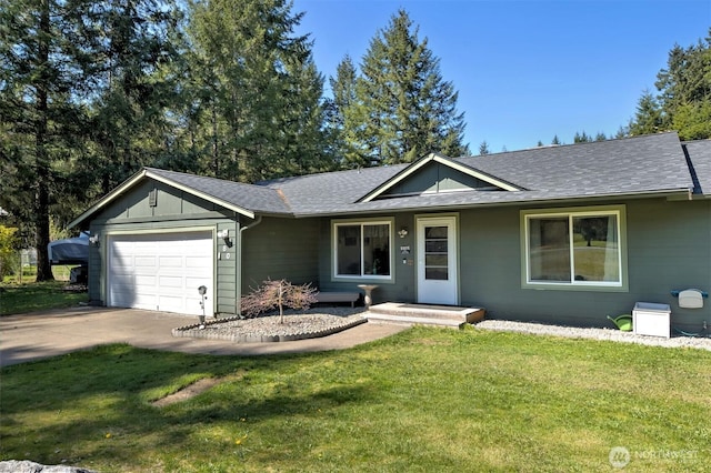 single story home featuring a front yard, concrete driveway, an attached garage, and a shingled roof