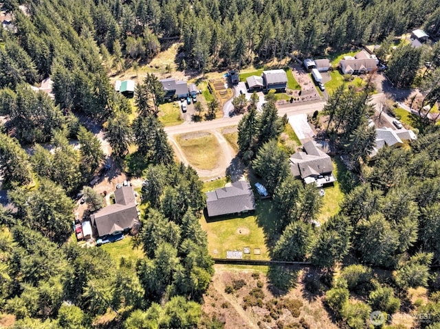 birds eye view of property with a residential view