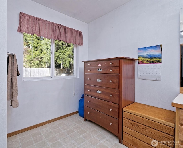 unfurnished bedroom featuring baseboards