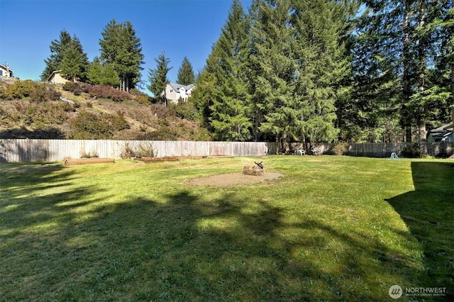 view of yard with fence