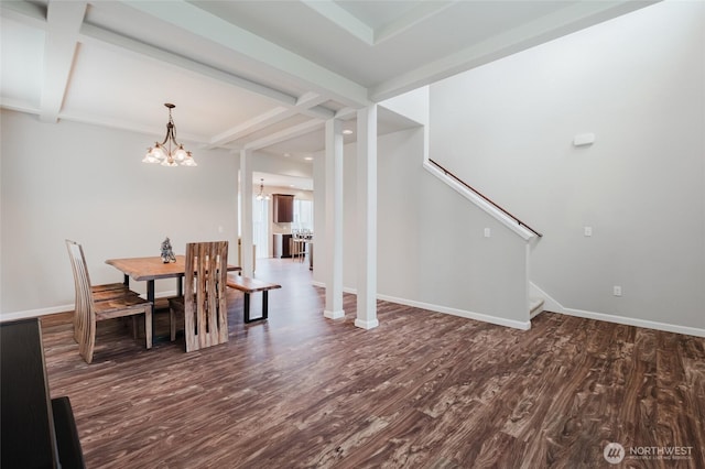 dining area featuring wood finished floors, baseboards, stairs, beamed ceiling, and a notable chandelier