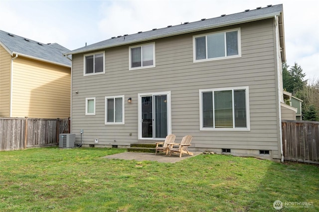 rear view of house featuring a lawn, central AC, a fenced backyard, and a patio area