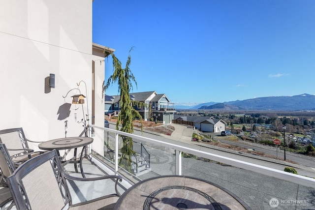 balcony featuring a mountain view