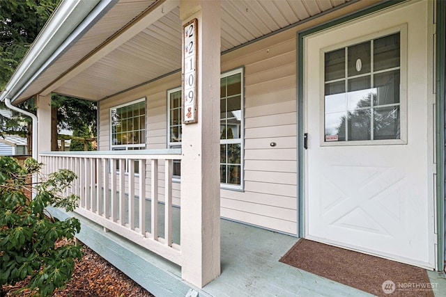 entrance to property with covered porch