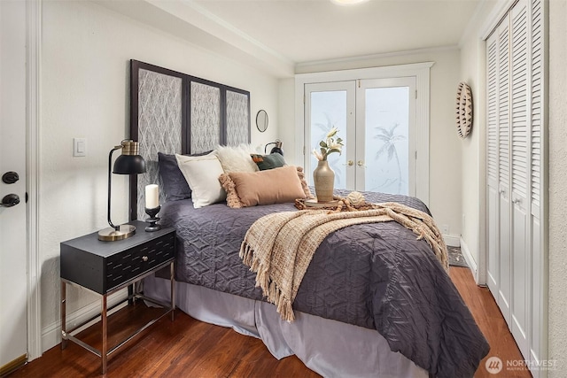 bedroom with access to exterior, wood finished floors, french doors, and ornamental molding