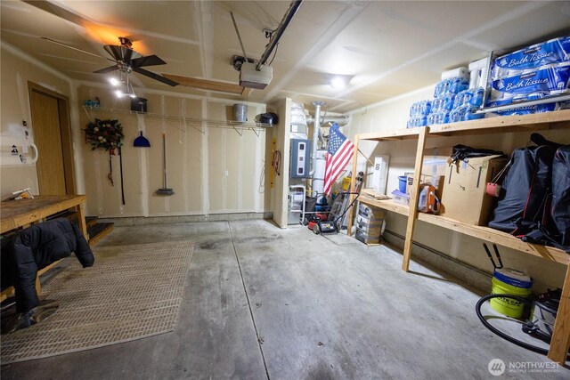 garage with a workshop area and a garage door opener