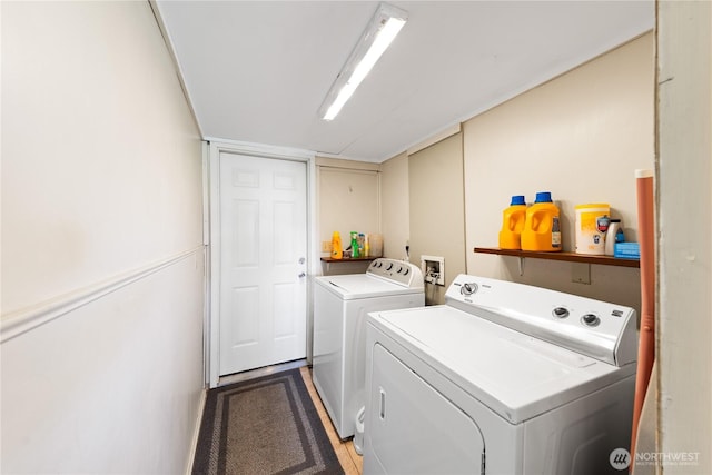 laundry room with laundry area and washing machine and dryer