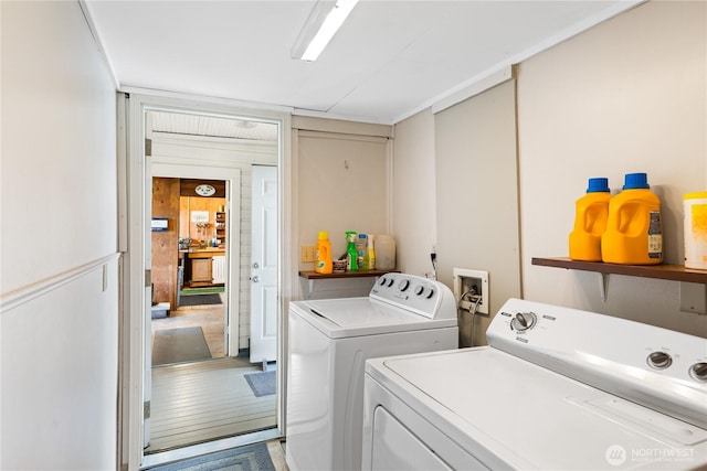 laundry area featuring laundry area and washing machine and clothes dryer