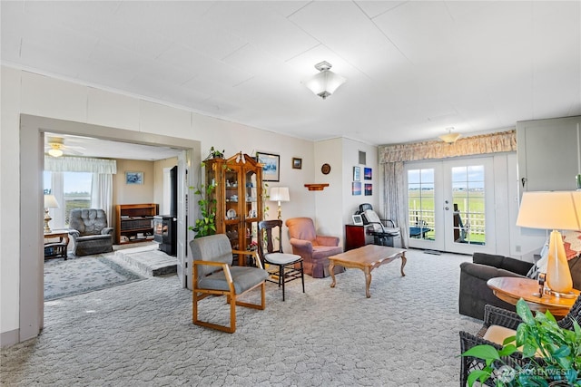 living room featuring carpet flooring and french doors