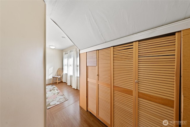 corridor with wood finished floors