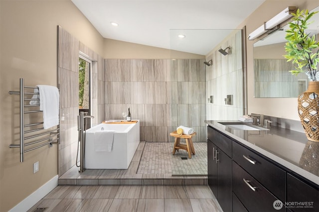 full bath featuring vanity, a soaking tub, radiator heating unit, recessed lighting, and a tile shower