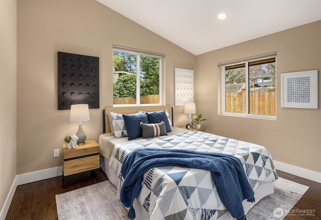 bedroom with recessed lighting, baseboards, lofted ceiling, and wood finished floors