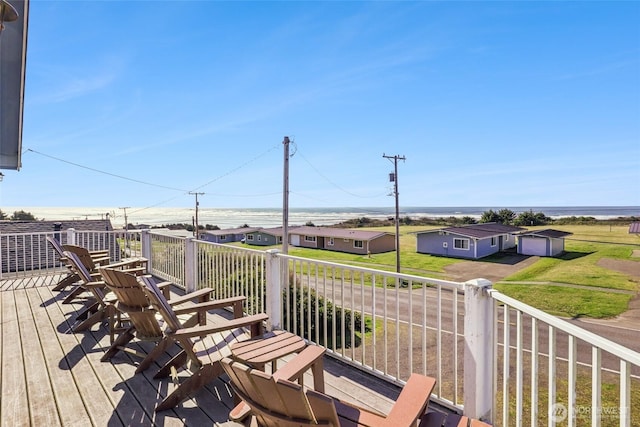 deck featuring driveway and a garage