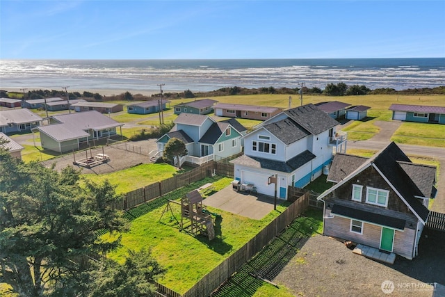 birds eye view of property with a residential view