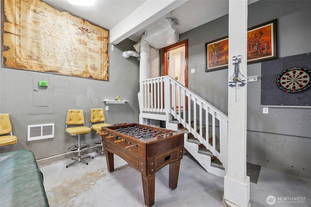 game room with visible vents and concrete flooring