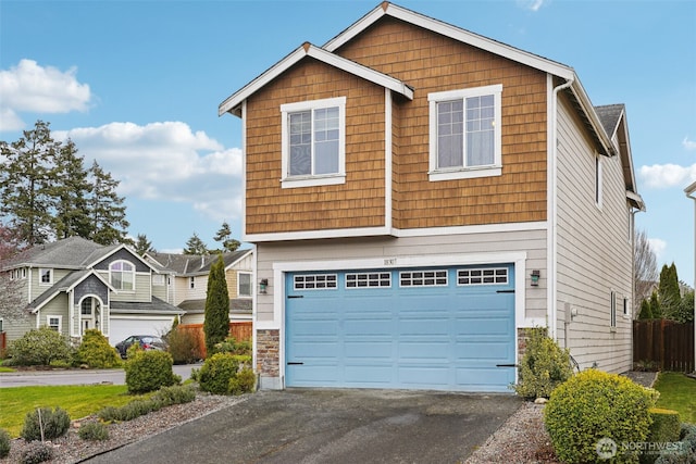 view of front facade featuring driveway and a garage