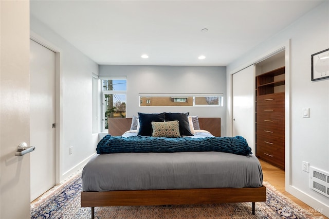 bedroom with recessed lighting and baseboards