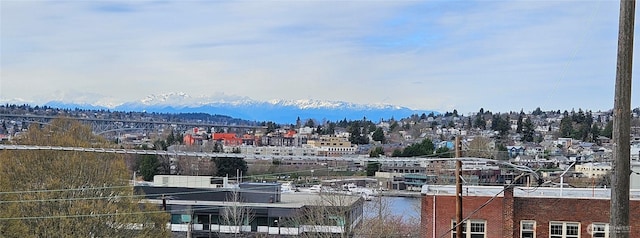 view of city with a water and mountain view